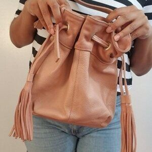 AEO American Eagle Cross Body Bucket Bag in Leather with Tassel Detail Pale Pink